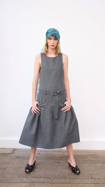 Model wearing grey midi Dress and a blue scarf