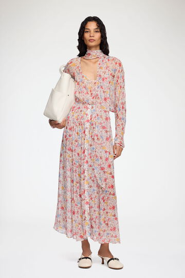 Model wearing long floral dress