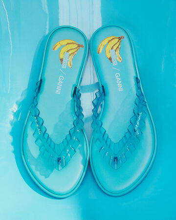 GANNI x Melissa blue flip flops