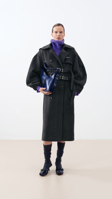 Model wearing grey midi Dress and a blue scarf