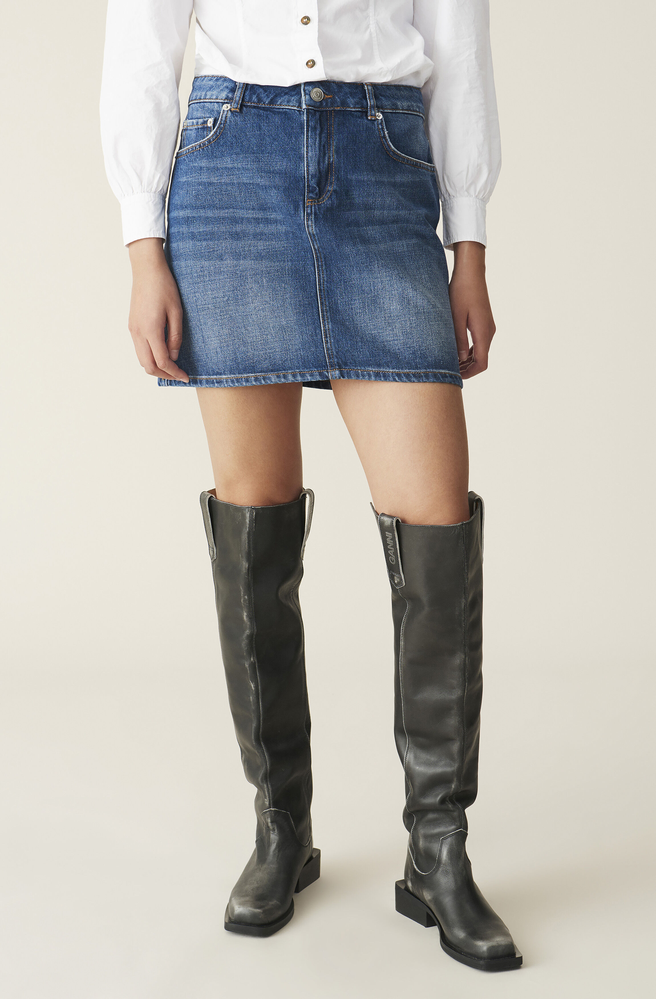 denim skirt and thigh high boots