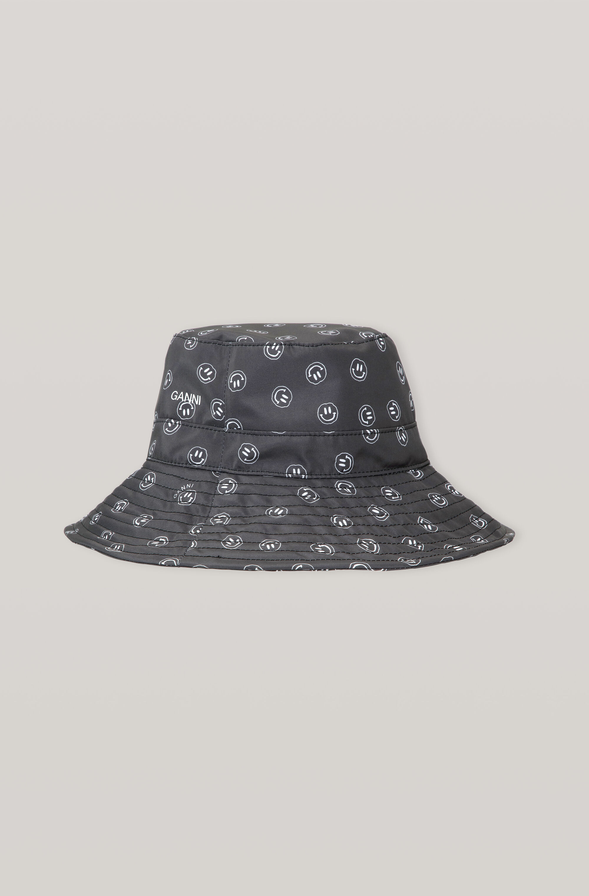 ganni.com | Recycled Tech Fabric Smiley Bucket Hat