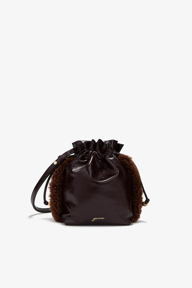 Quick buy Pouch in Brown Select color: Demitasse Select color: Almond Milk Select color: Black Select color: Antique Bronze +4