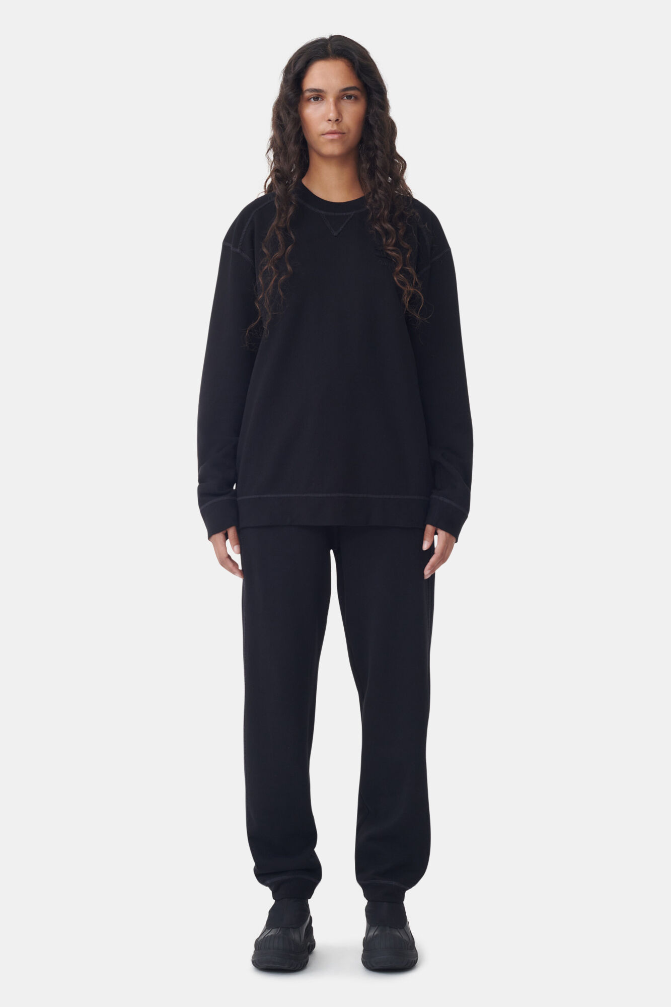 Schwarze Isoli-Hose mit Bündchen, Cotton, in colour Black - 1 - GANNI